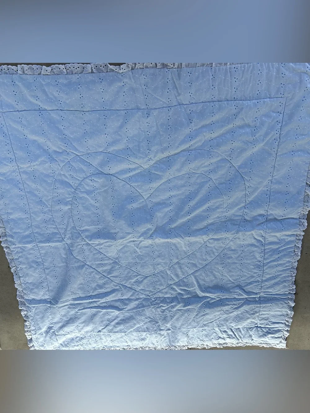 White Eyelet baby blanket white with blue undertone and heart design